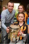 1 October 2012; Kilkenny captain Eoin Larkin with Anna Félix, aged 12, and her sister Emily, aged 14, from Gowran, Co. Kilkenny, with the Liam MacCarthy Cup during a visit to Our Lady's Hospital for Sick Children, Crumlin, Dublin. Picture credit: Barry Cregg / SPORTSFILE