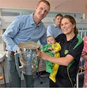 1 October 2012; Aoife O'Hare with her son Donncha, aged 11 weeks, from Moville, Co. Donegal, along with Kilkenny's Henry Shefflin and the Liam MacCarthy Cup during a visit to Our Lady's Hospital for Sick Children, Crumlin, Dublin. Picture credit: Barry Cregg / SPORTSFILE