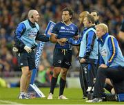 6 October 2012; Isa Nacewa, Leinster, leaves the pitch during the second half accompanied by team physio Garreth Farrell. Celtic League 2012/13, Round 6, Leinster v Munster, Aviva Stadium, Lansdowne Road, Dublin. Picture credit: Brendan Moran / SPORTSFILE