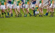 7 October 2012; Ryan Healion holds the hand of his uncle Peter Healion, Kilcormac / Killoughey, during the pre-match parade. Offaly County Senior Hurling Championship Final, Kilcormac / Killoughey v St Rynagh's, O'Connor Park, Tullamore, Co. Offaly. Picture credit: Brian Lawless / SPORTSFILE