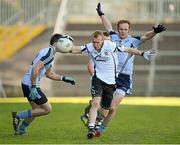 21 October 2012; Niall McEvoy, Kilcoo, in action against Keith Quinn and Benny Coulter, Mayobridge. Down County Senior Football Championship Final, Mayobridge v Kilcoo, Pairc Esler, Newry, Co. Down. Picture credit: Oliver McVeigh / SPORTSFILE