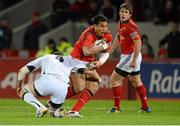 26 October 2012; Casey Laulala, Munster, is tackled by Emiliano Caffini, Zebre. Celtic League 2012/13, Round 7, Munster v Zebre, Thomond Park, Limerick. Picture credit: Matt Browne / SPORTSFILE