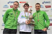 29 October 2012; The first 3 Irishmen home, from left, 2nd placed, Sean Hehir, 1st placed Paul Pollock, Co. Down, and 3rd placed Barry Minnock, Co. Offaly, during the Dublin Marathon 2012. Merrion Square, Dublin. Picture credit: Brendan Moran / SPORTSFILE