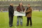 4 November 2012; Killian Byrne, from Tallaght Stadium, is presented with a trophy by Ian McClemmond, right, from STRI, and Billy Coman, left, during the Pitch of the Year Presentation at the 2012 FAI Ford Cup Final, Derry City v St. Patrick's Athletic, Aviva Stadium, Lansdowne Road, Dublin. Picture credit: Matt Browne / SPORTSFILE