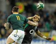 10 November 2012; Simon Zebo, Ireland, is tackled by Francois Hougaard, left, and Jaco Taute, hidden, South Africa. Autumn International, Ireland v South Africa, Aviva Stadium, Lansdowne Road, Dublin. Picture credit: David Maher / SPORTSFILE