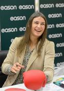 11 November 2012; Olympic Boxing Champion Katie Taylor signing her new book 'My Olympic Dream' in Easons O'Connell Street. Katie's new book is available from today in all Easons stores nationwide and on easons.com. Katie Taylor Book Signing, Easons, O'Connell Street, Dublin. Picture credit: Stephen McCarthy / SPORTSFILE