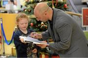 11 November 2012; Rachel McGrath, age 6, from Kilryland, Co. Carlow, has a copy of Olympic Boxing Champion Katie Taylor's new book 'My Olympic Dream' signed by Katie's father and coach Pete in Easons O'Connell Street. Katie's new book is available from today in all Easons stores nationwide and on easons.com. Katie Taylor Book Signing, Easons, O'Connell Street, Dublin. Picture credit: Stephen McCarthy / SPORTSFILE