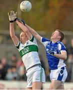 11 November 2012; Brian McCormack, Portlaoise, in action against Padraig Higgins, St. Patrick's. AIB Leinster GAA Football Senior Championship Quarter-Final, St. Patrick's, Wicklow v Portlaoise, Co. Laois, County Grounds, Aughrim, Co. Wicklow. Picture credit: Barry Cregg / SPORTSFILE