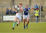 11 November 2012; Brian Glynn, Portlaoise, in action against Darragh O'Sullivan, St. Patrick's. AIB Leinster GAA Football Senior Championship Quarter-Final, St. Patrick's, Wicklow v Portlaoise, Co. Laois, County Grounds, Aughrim, Co. Wicklow. Picture credit: Barry Cregg / SPORTSFILE