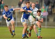 11 November 2012; Pól Mac Oitir, Portlaoise, with support from team-mate Tom Fitzgerald, in action against Paul Earls, centre, and Donal Fitzgerald, left, St. Patrick's. AIB Leinster GAA Football Senior Championship Quarter-Final, St. Patrick's, Wicklow v Portlaoise, Co. Laois, County Grounds, Aughrim, Co. Wicklow. Picture credit: Barry Cregg / SPORTSFILE