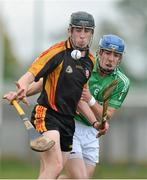 14 November 2012; Eoghan Keogh, Ard Scoil Rís, in action against Tom Carroll, St Colman's. Munster Colleges Dr. Harty Cup Senior A Hurling, Ard Scoil Rís, Limerick v St Colman's, Fermoy. Cahir, Co. Tipperary. Picture credit: Diarmuid Greene / SPORTSFILE