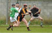 14 November 2012; David Dempsey, Ard Scoil Rís, shoots to score his side's second goal despite the efforts of Sean Linehan and goalkeeper Darragh O'Callaghan, St Colman's. Munster Colleges Dr. Harty Cup Senior A Hurling, Ard Scoil Rís, Limerick v St Colman's, Fermoy. Cahir, Co. Tipperary. Picture credit: Diarmuid Greene / SPORTSFILE