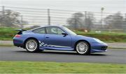 16 November 2012; A general view of members of the media in action on track in a Porsche 911 during a media launch of the new &quot;Race Experience&quot; at Mondello Park, Donore, Naas, Co. Kildare. Picture credit: Barry Cregg / SPORTSFILE