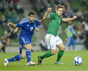 14 November 2012; Kevin Doyle, Republic of Ireland in action against Sokratis Papastathopoulos, Greece. Friendly International, Republic of Ireland v Greece, Aviva Stadium, Lansdowne Road, Dublin. Picture credit: Matt Browne / SPORTSFILE