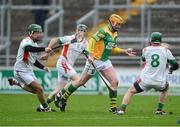 18 November 2012; Peter Healion, Kilcormac / Killoughey, in action against  Rathdowney / Errill players, left to right, James Ryan, Enda Meagher and Shane Dollard. AIB Leinster GAA Hurling Senior Championship Semi-Final, Kilcormac / Killoughey, Offaly v Rathdowney / Errill, Laois, O'Connor Park, Tullamore, Co. Offaly. Picture credit: David Maher / SPORTSFILE