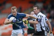 18 November 2012; Michael Pollock, St Gall's, in action against Sean O'Hanlon, Kilcoo. AIB Ulster GAA Football Senior Championship Semi-Final, St Gall's, Antrim v Kilcoo, Down, Athletic Grounds, Armagh. Picture credit: Oliver McVeigh / SPORTSFILE