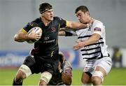 18 November 2012; Robbie Diack, Ulster, is tackled by  Emiliano Caffini, Zebre. Celtic League, Round 4, Zebre v Ulster, Stadio XXV Aprile, Parma, Italy. Picture credit: Roberto Bregani / SPORTSFILE