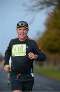 18 November 2012; Derry McVeigh in action during the New York Dublin Marathon. The marathon was organised as a result of the cancellation of the official New York marathon due to the devastation caused by Hurricane Sandy. Phoenix Park, Dublin. Picture credit: Brian Lawless / SPORTSFILE