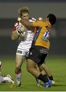 23 November 2012; Andrew Trimble, Ulster, is tackled by Christian Loamanu, Benetton Treviso. Celtic League 2012/13, Round 9, Benetton Treviso v Ulster, Stadio Mongio, Treviso, Italy. Picture credit: Roberto Bregani / SPORTSFILE