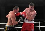 23 November 2012; Joe Ward, British Lionhearts, right, exchanges punches with Imre Szello, Italia Thunder, during their Light Heavyweight 80-85kg bout. World Series of Boxing, British Lionhearts v Italia Thunder, Celtic Manor Resort, Newport, Wales. Picture credit: Steve Pope / SPORTSFILE