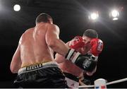 23 November 2012; Joe Ward, British Lionhearts, right, exchanges punches with Imre Szello, Italia Thunder, during their Light Heavyweight 80-85kg bout. World Series of Boxing, British Lionhearts v Italia Thunder, Celtic Manor Resort, Newport, Wales. Picture credit: Steve Pope / SPORTSFILE