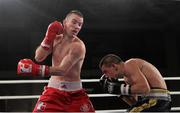 23 November 2012; John Joe Nevin, British Lionhearts, left, exchanges punches with Branimir Stankovic, Italia Thunder, during their Lightweight 57-61kg bout. World Series of Boxing, British Lionhearts v Italia Thunder, Celtic Manor Resort, Newport, Wales. Picture credit: Steve Pope / SPORTSFILE