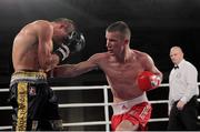 23 November 2012; John Joe Nevin, British Lionhearts, right, exchanges punches with Branimir Stankovic, Italia Thunder, during their Lightweight 57-61kg bout. World Series of Boxing, British Lionhearts v Italia Thunder, Celtic Manor Resort, Newport, Wales. Picture credit: Steve Pope / SPORTSFILE