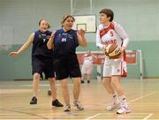 24 November 2012; Faye Boyd, Antrim Borough Special Olympics Club, in action against, Aisling Beacon, Blue Dolphin Special Olympics Club, Wicklow. 2012 Special Olympics Ireland Women's National Basketball Cup Final, Antrim Borough Special Olympics Club v Blue Dolphin Special Olympics Club, Gormanston College, Co. Meath. Photo by Sportsfile