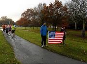 18 November 2012; Damien Byrne, from Kimmage, Dublin, and Martha Murphy, from Kimmage, Dublin, cheer on participants during the New York Dublin Marathon. The marathon was organised as a result of the cancellation of the official New York marathon due to the devastation caused by Hurricane Sandy. Phoenix Park, Dublin. Picture credit: Brian Lawless / SPORTSFILE