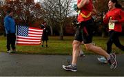 18 November 2012; Damien Byrne, from Kimmage, Dublin, and Martha Murphy, from Kimmage, Dublin, cheer on participants during the New York Dublin Marathon. The marathon was organised as a result of the cancellation of the official New York marathon due to the devastation caused by Hurricane Sandy. Phoenix Park, Dublin. Picture credit: Brian Lawless / SPORTSFILE