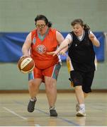 24 November 2012; Julie Carroll, Sports Club 15 Special Olympics Club, Dublin, in action against Aine Naughton, Connaught Special Olympics Club. 2012 Special Olympics Ireland Women's National Basketball Plate, Connaught Special Olympics Club v Sports Club 15 Special Olympics Club, Dublin, Gormanston College, Co. Meath. Photo by Sportsfile