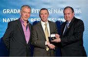 24 November 2012; Referee Michael Duffy, from Sligo, is presented with his All-Ireland Inter-Provincial Football Chamionship referees' medal by Uachtarán Chumann Lúthchleas Gael Liam Ó Néill, right, and Chairman of the National Referees Committee, Pat McEnaney. 2012 National Referees' Awards Banquet, Croke Park, Dublin. Picture credit: Barry Cregg / SPORTSFILE