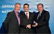 24 November 2012; Referee Colm Lyons, from Cork, is presented with his All-Ireland Minor Hurling Chamionship, Allianz Huling League Division 2A & Inter-Provinical Hurling Chamionship referees' medal by Uachtarán Chumann Lúthchleas Gael Liam Ó Néill, right, and Chairman of the National Referees Committee, Pat McEnaney. 2012 National Referees' Awards Banquet, Croke Park, Dublin. Picture credit: Barry Cregg / SPORTSFILE