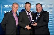 24 November 2012; Referee Maurice Deegan, from Laois, is presented with his All-Ireland Senior Championship & Allianz Football League Division 1 referees' award by Uachtarán Chumann Lúthchleas Gael Liam Ó Néill, right, and Chairman of the National Referees Committee, Pat McEnaney. 2012 National Referees' Awards Banquet, Croke Park, Dublin. Picture credit: Barry Cregg / SPORTSFILE