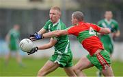 25 November 2012; Ray Cahill, Sarsfields, in action against Eoin Dolan, Ballymun Kickhams. AIB Leinster GAA Football Senior Club Championship Semi-Final, Sarsfields, Kildare v Ballymun Kickhams, Dublin, St Conleth's Park, Newbridge, Co. Kildare. Picture credit: Barry Cregg / SPORTSFILE