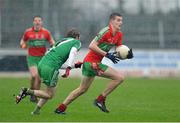 25 November 2012; Jason Whelan, Ballymun Kickhams, in action against Donnachadh McDonnell, Sarsfields. AIB Leinster GAA Football Senior Club Championship Semi-Final, Sarsfields, Kildare v Ballymun Kickhams, Dublin, St Conleth's Park, Newbridge, Co. Kildare. Picture credit: Barry Cregg / SPORTSFILE