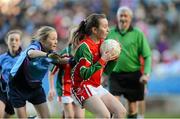 27 November 2012; Rebecca Sheridan, St Brigid’s Castleknock, in action against Grá de Nais, Scoil Lorcáin Baile na Manach. Allianz Cumann na mBunscol Finals, St Brigid’s Castleknock v Scoil Lorcáin Baile na Manach. Some 1,200 players took part over the two day finals. Croke Park, Dublin. Picture credit: Brian Lawless / SPORTSFILE