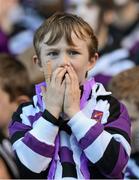 27 November 2012; Andrew Cotter, a third class pupil and supporter of Terenure Junior School looks on anxiously during his team's 1-13 to 2-6 victory over Divine Word Marley during one of the Allianz Cumann na mBunscol Finals, Croke Park, Dublin.Some 1,200 players took part in the finals which were played at the GAA head quarters over the last two days. Picture credit: Ray McManus / SPORTSFILE