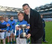 27 November 2012; Ciaran Whelan, Allianz, presents David McCormack, captain, St Oliver Plunkett Malahide, with the cup. Allianz Cumann na mBunscol Finals, St Oliver Plunkett Malahide v St Patrick’s Hollypark, Croke Park, Dublin. Some 1,200 players took part in the finals which were played at the GAA head quarters over the last two days. Picture credit: Brian Lawless / SPORTSFILE