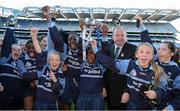 27 November 2012; Liam Ó Néill, Uachtarán, Chumann Lúthchleas Gael, presents Corn Na Laoch to Agusta Njongwe, captain of Scoil Archbishop Ryan, Balgaddy, Co. Dublin, after their Allianz Cumann na mBunscol Final. Some 1,200 players took part over the two day finals. Croke Park, Dublin. Picture credit: Ray McManus / SPORTSFILE