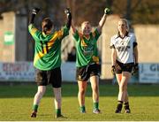 1 December 2012; Thomas Davis players Kate Fitzsimons and Sinead Deegan, 11, celebrate at the final whistle while Siobhan Browne, Boherbue, looks on. TESCO HomeGrown All-Ireland Junior Club Final, Boherbue, Cork v Thomas Davis, Dublin, St. Brendan’s Park, Birr, Co. Offaly. Picture credit: Pat Murphy / SPORTSFILE