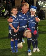 1 December 2012; Leinster captain Leo Cullen with mascots Fionn Medlar, from Rathfarnham, Dublin, and Molly D'Arcy, from Gorey, Co. Wexford, at Leinster v Zebre. Celtic League 2012/13, Round 10, Leinster v Zebre, RDS, Ballsbridge, Dublin. Picture credit: Stephen McCarthy / SPORTSFILE