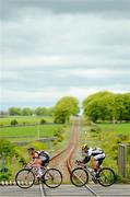 22 May 2012; Philip Lavery, Node4 Giordana, left, and Scott Creighton, New Zealand National team, go over a level crossing at Ardrahan, Co. Galway, during the third stage of the 2012 An Post Rás. Gort - Westport. Picture credit: Stephen McCarthy / SPORTSFILE