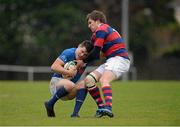 5 January 2013; Marcus O'Driscoll, St. Mary's College, is tackled by Darragh Fitzpatrick, Clontarf. Ulster Bank League, Division 1A, St Mary's College v Clontarf, Templeville Road, Templeogue, Dublin. Picture credit: Stephen McCarthy / SPORTSFILE