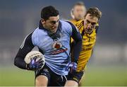 9 January 2013; Bernard Brogan, Dublin, in action against William Lowry, DCU, Parnell Park, Donnycarney, Dublin. Picture credit: Barry Cregg / SPORTSFILE