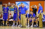 11 January 2013; UCD Marian head coach Fran Ryan, centre, and the UCD bench react to a late call in the game. 2013 Basketball Ireland Men's Superleague National Cup Semi-Final, UL Eagles v UCD Marian, Neptune Stadium, Cork. Picture credit: Brendan Moran / SPORTSFILE