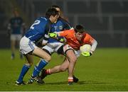 12 January 2013; Eugene McVerry, Armagh, in action against Oisin Minagh, left, and Mark Shields, Cavan. Power NI Dr. McKenna Cup, Section B, Round 2, Armagh v Cavan, Athletic Grounds, Armagh. Picture credit: Oliver McVeigh / SPORTSFILE