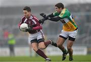 13 January 2013; David Glennon, Westmeath, in action against Paul McConway, Offaly. Bórd na Móna O'Byrne Cup, Group C, Westmeath v Offaly, Cusack Park, Mullingar, Co. Westmeath. Photo by Sportsfile