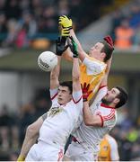13 January 2013; Michael McCann, Antrim, in action against Sean Warnock and Dean McNally, Tyrone. Power NI Dr. McKenna Cup, Section C, Round 2, Antrim v Tyrone, Casement Park, Belfast, Co. Antrim. Picture credit: Oliver McVeigh / SPORTSFILE