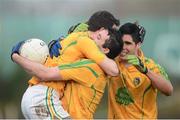 13 January 2013; Emlyn Mulligan, right, Leitrim captain celebrates with Wayne McKeon, centre and Paddy McGowan, at the end of the game. Connacht FBD League Section B, Leitrim v Mayo, Páirc Seán O'Heslin, Ballinamore, Co. Leitrim. Picture credit: David Maher / SPORTSFILE